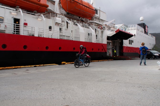 Jan cycling off the Hurtigruten in Honningsvåg.