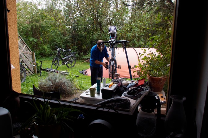 Tom working on the bikes in his back yard.