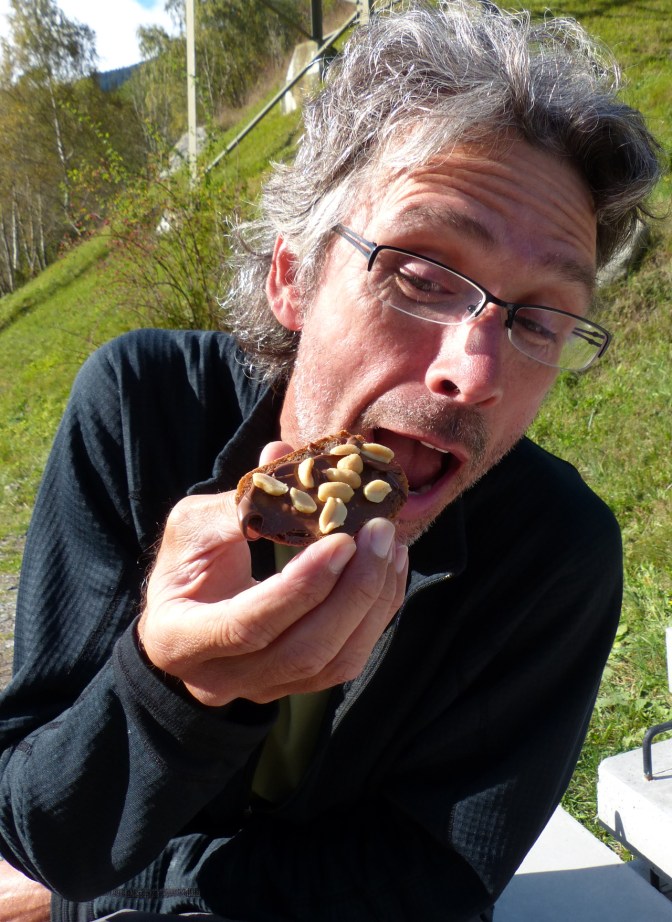 Paul digs into a Nutella and peanut sandwich.