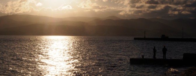 Fishing along the Orebić waterfront.
