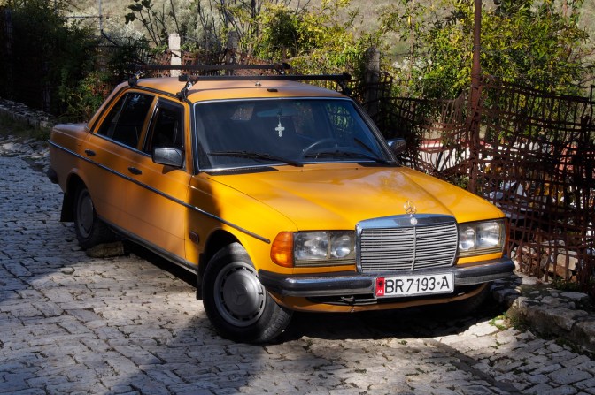 One of the many Mercedes 240D.