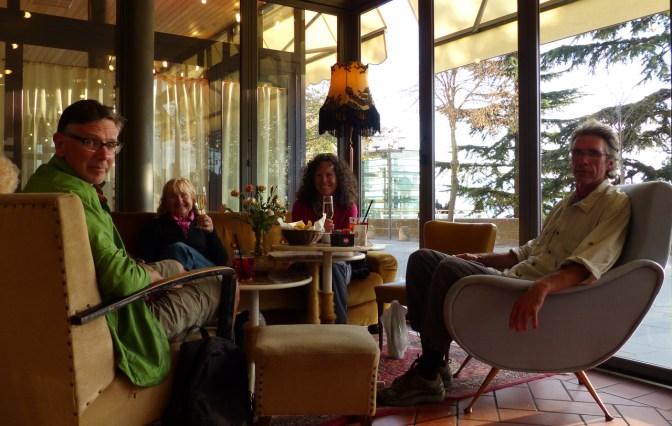 Having a drink in the living room like lounge in a San Marino café.