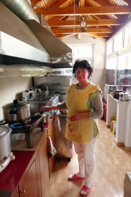 The cook in her kitchen.