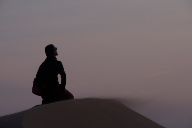 Sebastian at sunset at Wahiba Sands.