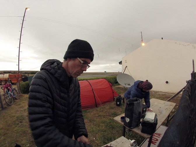 Making dinner camped beside the house at Tapi Aike.