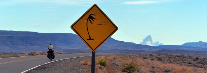 Cycling into the wind with Cerro Torre on the horizon.