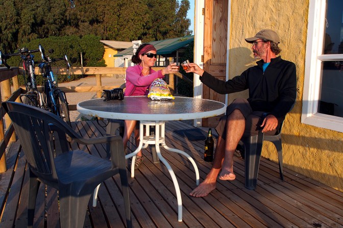 Cheers! Chilling on the deck of our beachfront cabaña in Guanaqueros.