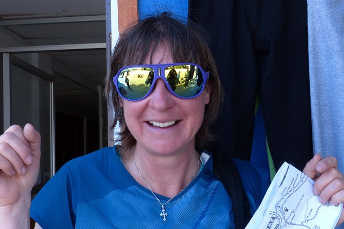 Anita trying on a new pair of sunglasses.