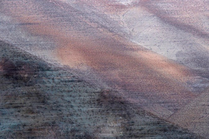 Abstract mountain scene at sunset.