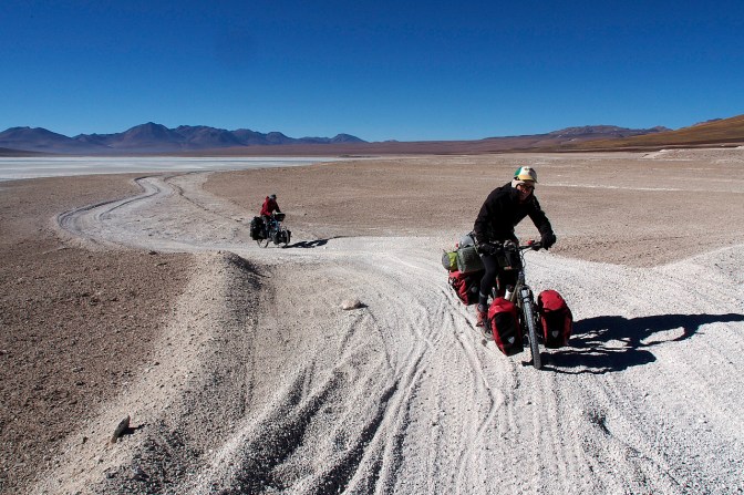 Nicholas and Jan dancing in the sand at Laguna Blanca.