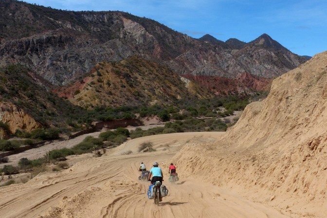Paul, Elmar and Ellen descending one of the many sandy hairpins to Pena Colorada.