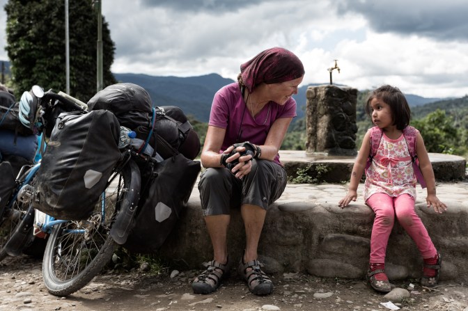 Jan with a little friend who sat down to chat and show off her Dora the Explorer stickers.