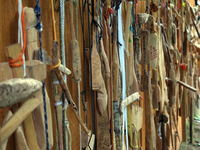 Carved paddles on the Isaac Lake shelter.