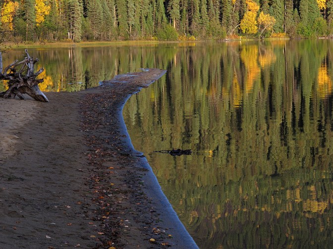Pat Point divides Swan Lake and the Spectacle Lakes.