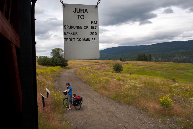 A marker on a gazebo lets us know the distances to the next stops along the trail.